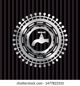 tap icon inside silver emblem or badge