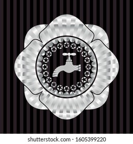 tap icon inside silver emblem