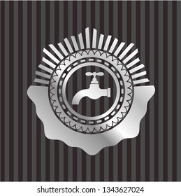 tap icon inside silver shiny emblem