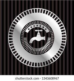 tap icon inside silvery emblem or badge