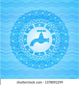 tap icon inside water wave emblem.
