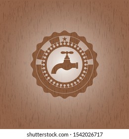 tap icon inside wood badge or emblem