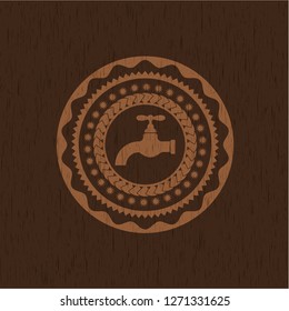 tap icon inside wood emblem