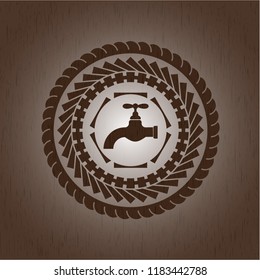 tap icon inside wooden emblem. Vintage.