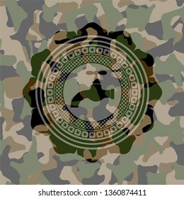 tap icon on camouflaged pattern