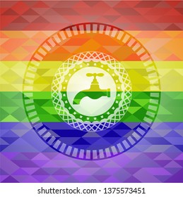 tap icon on mosaic background with the colors of the LGBT flag