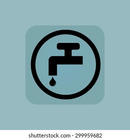 Tap with water drop in circle, in square, on pale blue background
