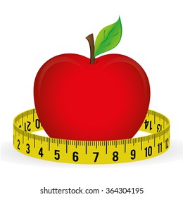 Tape measure, measuring tape and apple