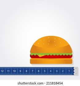 Tape measure measuring a sandwich with copy space to insert text. Measuring the calories. Sandwich and tape measure