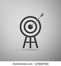 Target with arrow icon isolated on grey background. Dart board sign. Archery board icon. Dartboard sign. Business goal concept. Flat design. Vector Illustration