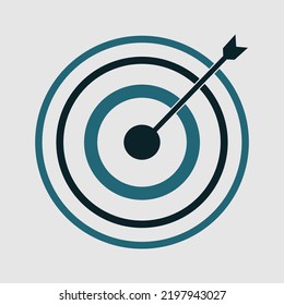 Target and arrow on light grey background