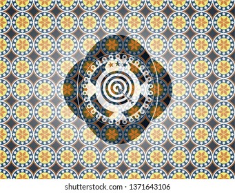 target, business icon inside arabic badge background. Arabesque decoration.