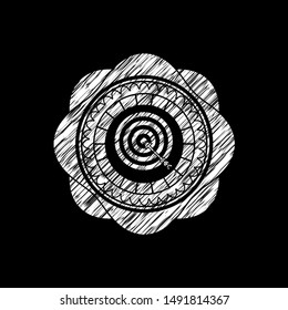 target, business icon inside chalkboard emblem written on a blackboard