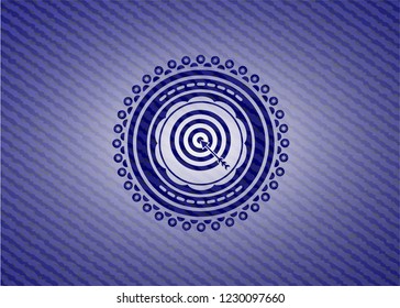 target, business icon inside emblem with jean background
