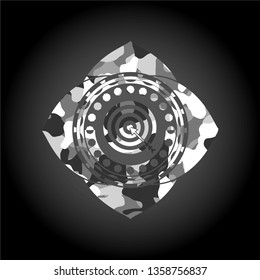 target, business icon inside grey camouflaged emblem