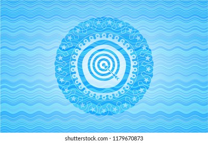 target, business icon inside light blue water wave badge background.