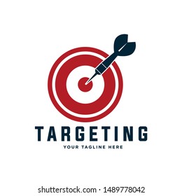 Target logo design. Dartboard and dart vector design. Target goal and arrow logotype