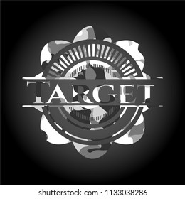 Target on grey camouflaged texture