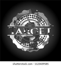 Target written on a grey camouflage texture