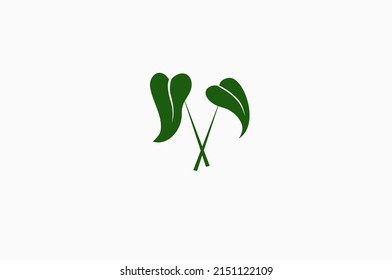 Diseño del logotipo cruzado de hoja de taro