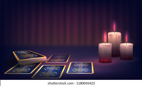 Tarot and candle on the fortune-teller's table, prediction of the future, dark magic