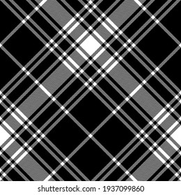 Tartan check plaid pattern in black and white. Large herringbone seamless graphic texture for blanket, duvet cover, scarf, other trendy autumn winter casual everyday fashion textile print.