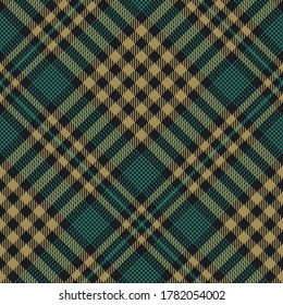 Tartan plaid pattern in black, gold, green. Seamless tweed check plaid graphic for skirt, tablecloth, or other modern autumn and winter fashion textile print.
