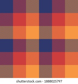 Tartan plaid pattern in blue, red, orange. Herringbone colorful textured checked graphic for flannel shirt, skirt, blanket, throw, duvet cover, or other modern autumn winter fashion textile print.