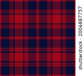 Tartan plaid pattern for winter in red and navy blue. Seamless herringbone textured simple check plaid graphic vector background for flannel shirt or other modern fashion fabric design.