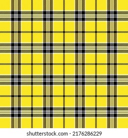 Tartan plaid. Scottish pattern in black, yellow and white cage. Scottish cage. Traditional Scottish checkered background. Seamless fabric texture. Vector illustration