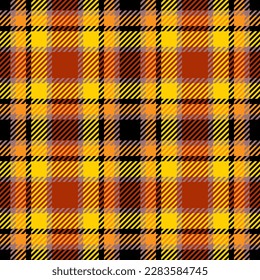 Tartan plaid seamless pattern. Traditional abstract geometric checkered backdrop in orange, yellow and black. Halloween colors colorful textile design