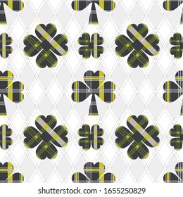 Tartan seamless pattern for saint Patrick's day with shamrocks.