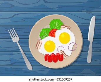 tasty breakfast  fried eggs plate knife and fork on wooden background top view