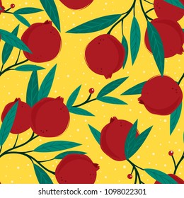 Tasty pomegranates. Colored vector seamless pattern. Yellow background