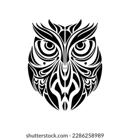 ﻿Owl tattoo with black  white colors, decorated with Polynesian designs.