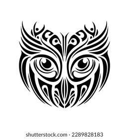 ﻿Owl tattoo with black and white colors and Polynesian designs.