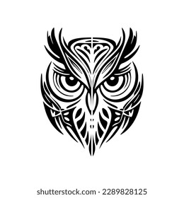 ﻿Owl tattoo in black and white with Polynesian designs.