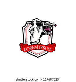 Tattoo Machine and Hand vector Badge logo template