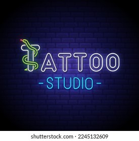 Tattoo parlor logo. Tattoo parlor neon sign, bright billboard, bright neon advertisement for tattoo parlor, studio. emblem. snake. Vector illustration in neon style