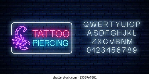 Tattoo and piercing parlor glowing neon signboard with scorpio emblem and alphabet. Tattooing salon sign in rectangle frame. Nightlife advertising symbol. Vector illustration.