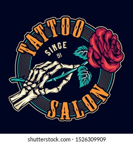 Tattoo studio colorful round print with skeleton hand holding blooming rose flower in vintage style isolated vector illustration