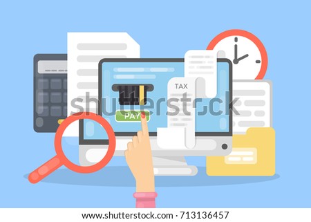 Tax payment online with computer. Anlyzing finances.