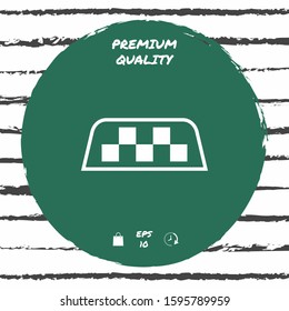 Taxi sign on taxi roof. Chequered pattern as a distinctive sign on a taxi