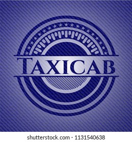 Taxicab badge with denim texture