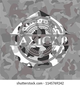 Taxicab on grey camouflaged texture