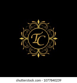 TC Initial logo. Ornament ampersand monogram golden logo black background