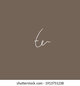 te brown background handwritten logo