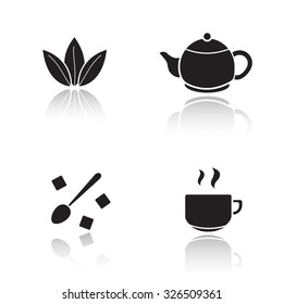 Tea accessories drop shadow icons set. Tea leaves and teapot cast shadow silhouettes illustrations isolated on white. Steaming teacup and spoon with sugar cubes. Vector infographics elements