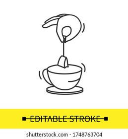 Icono de bolso de té.  Poniendo la mano en una taza. Ilustración del proceso de preparación de té envasado. Pictograma simple editable de línea vectorial dibujado para la instrucción, receta o icono de logotipo
