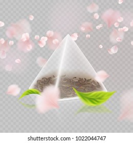 Tea bag pyramid shape isolated on transparent background. Realistic 3d teabag with flying petals. Vector mock up for your tea advertising design.
